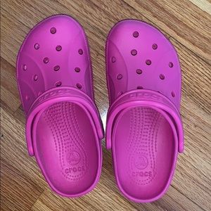 Pink crocs